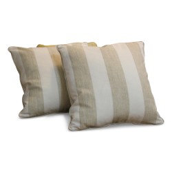 Pair of handmade decorative cushions in beige and white.